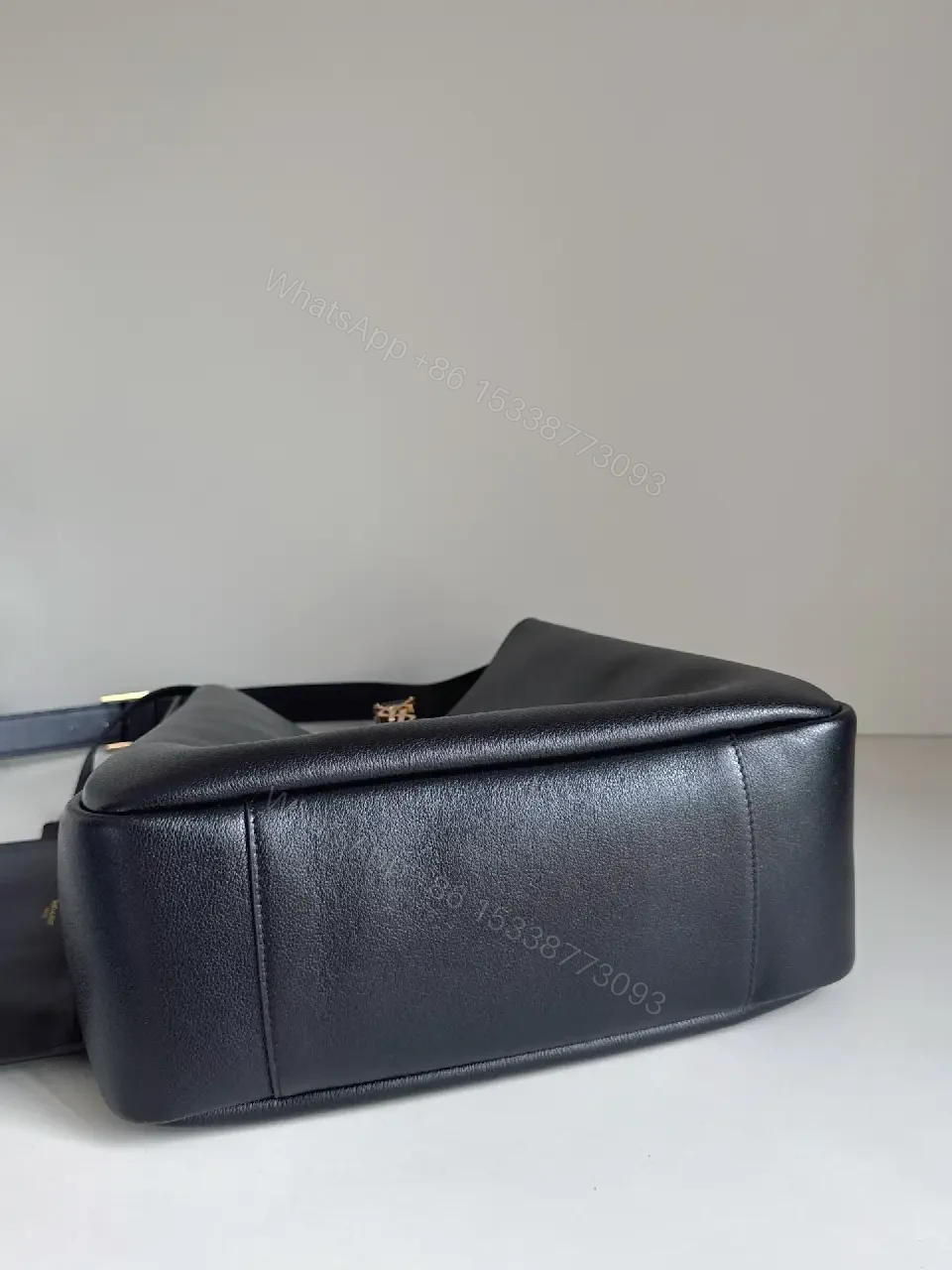 View 8 of Navy Leather Bucket Bag with Gold YSL Charm and Zippered Pocket