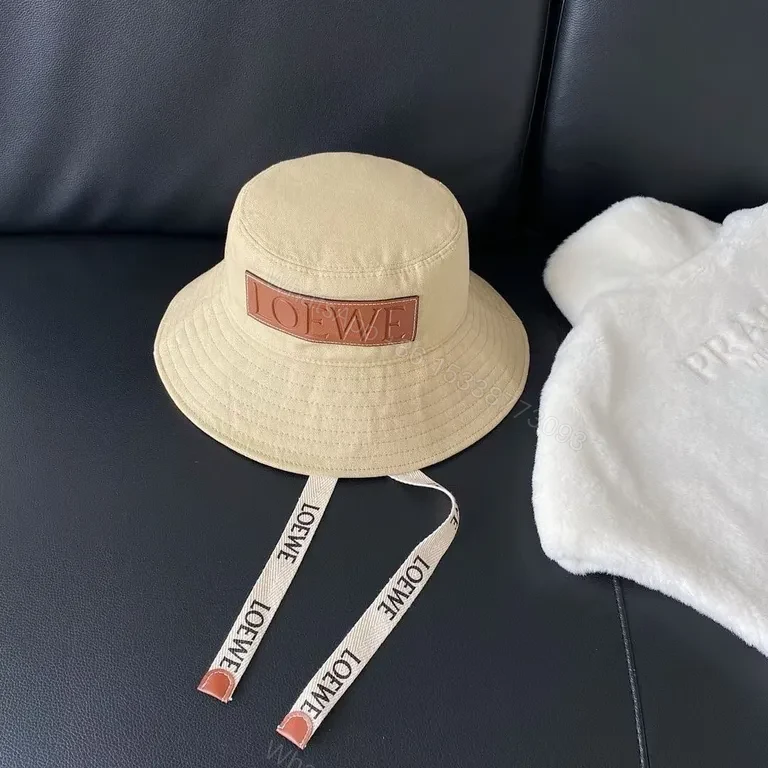 View 6 of Beige Cotton Bucket Hat with LOEWE Patch - Luxury Streetwear