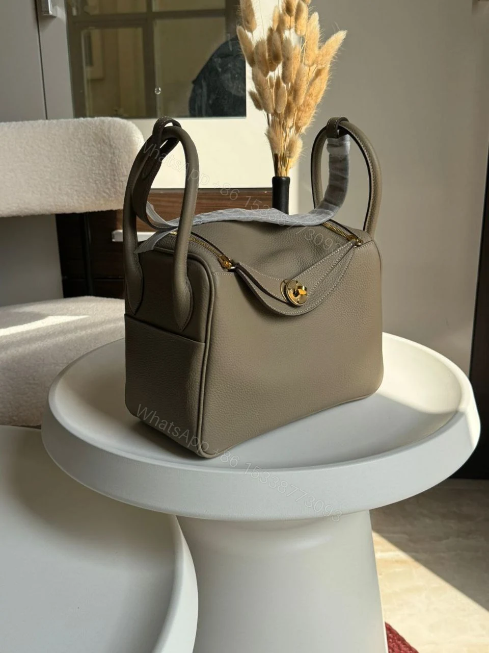 View 6 of HERMÈS Lindy 26 shoulder bag in Beton Evercolor leather