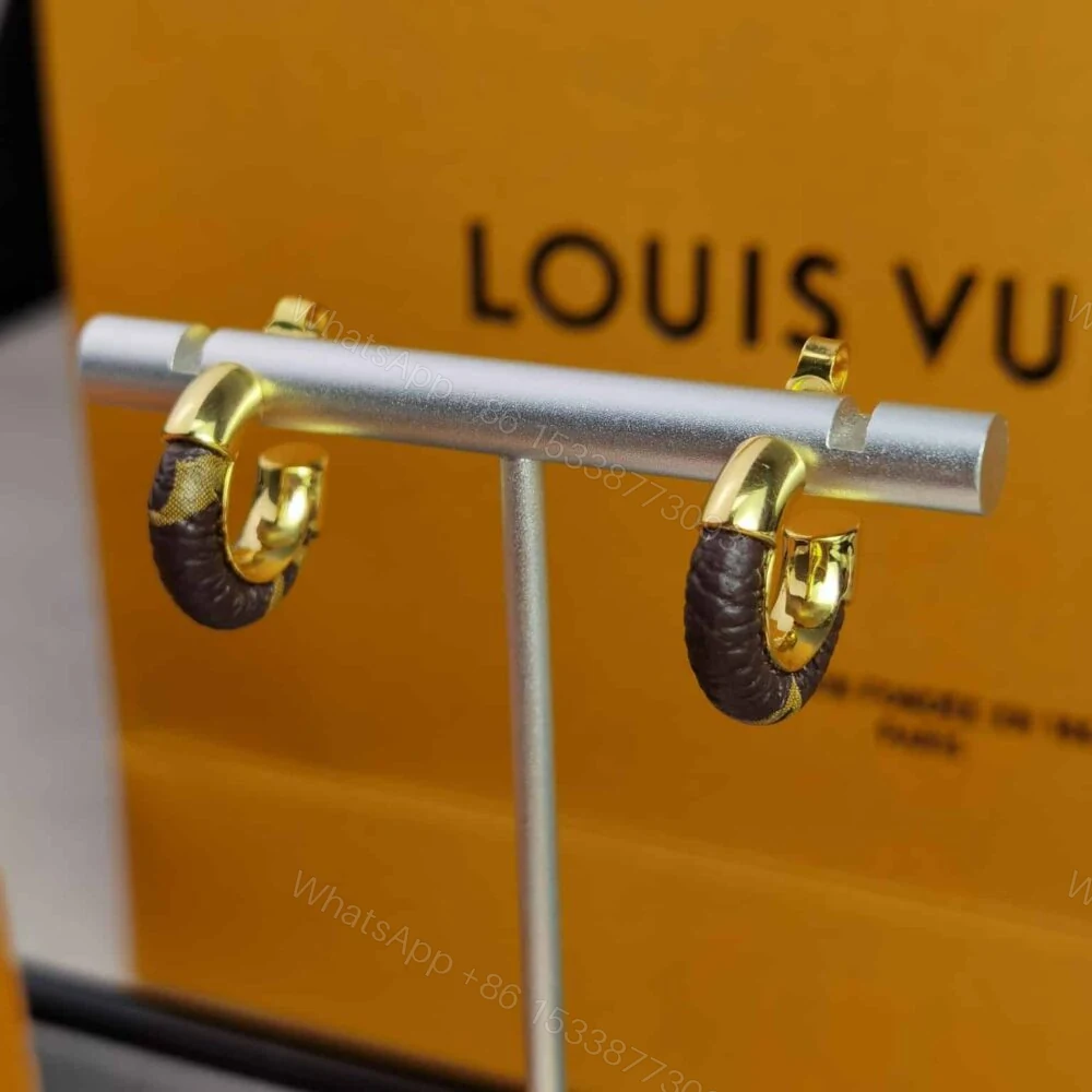 View 7 of Louis Vuitton Wild Mini Hoop Earrings M00474