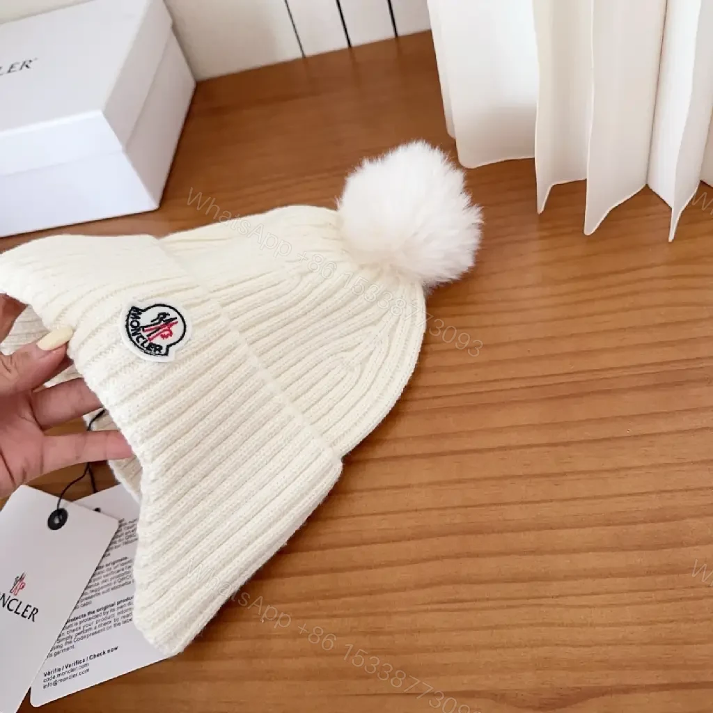 View 6 of Cozy White Knit Beanie with Pom Pom – Luxe Casual Style