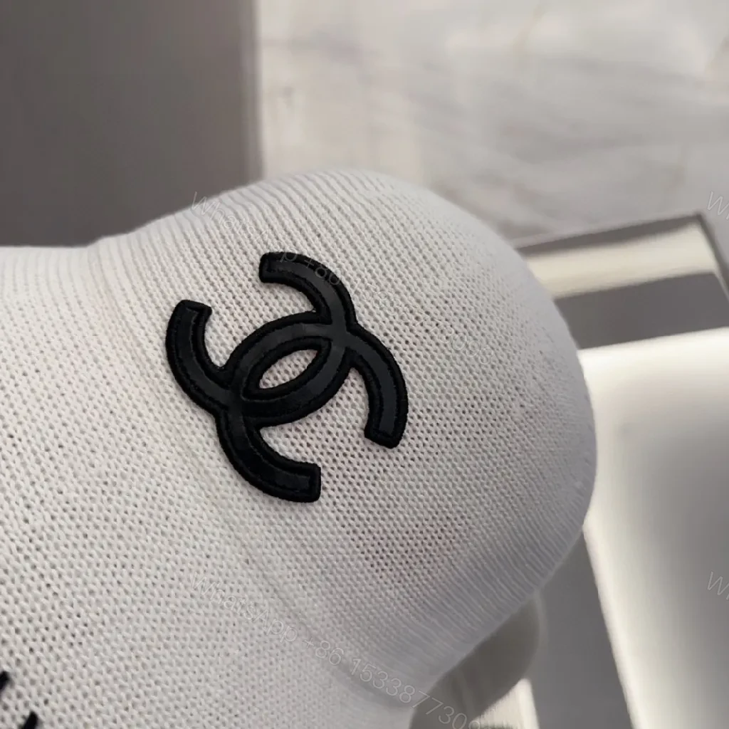 View 2 of Ivory Bucket Hat with Black Logo, Premium Stitching, one-size