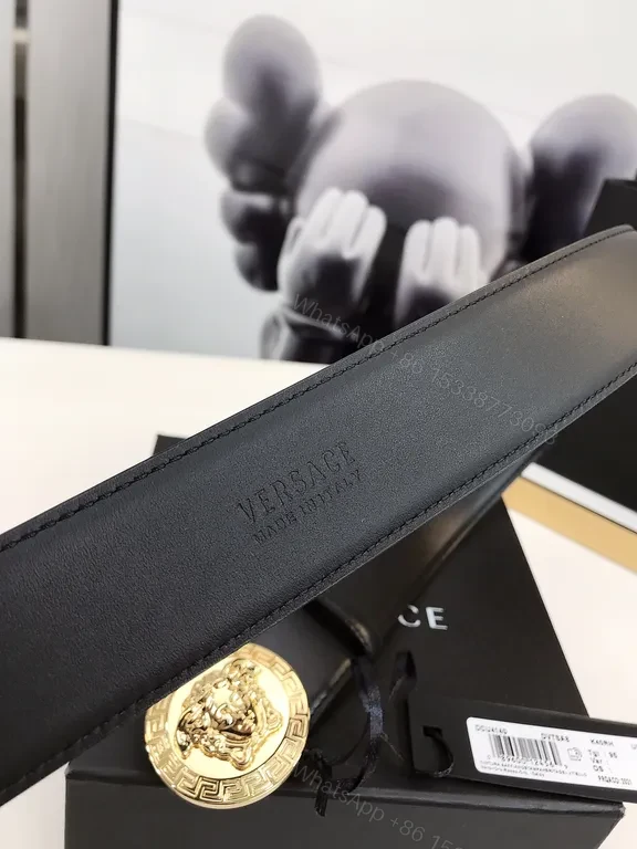 View 8 of Bold Medusa Buckle Belt: Luxury Black Leather Accessory