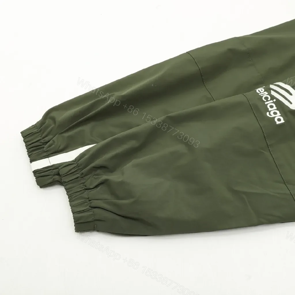 View 5 of Olive Pave Coach Jacket: Subtle Stride, Bold Presence