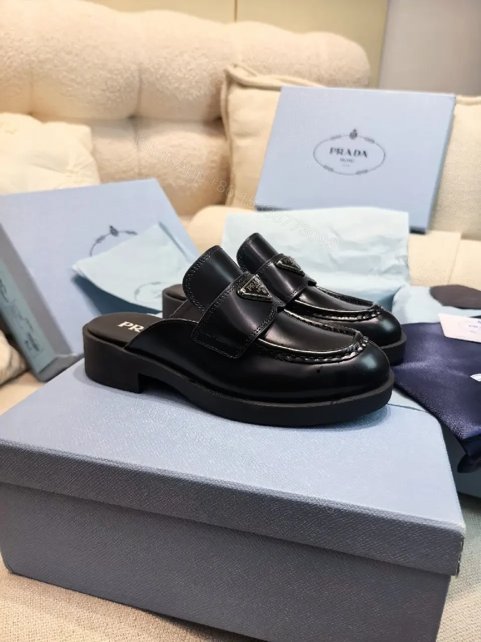 View 4 of Black Leather Prada Mules with Logo Detail Sliders, Women’s Fashion