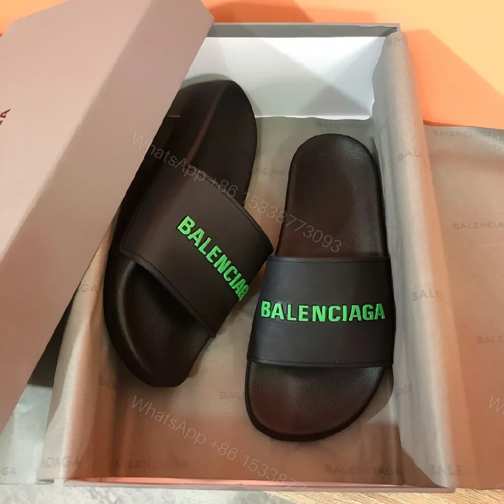 Bold Neon Logo Slides: Black Comfort, Statement Style — view 1