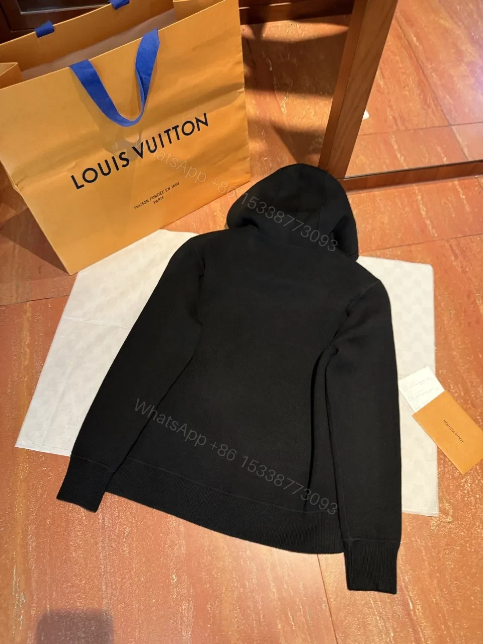 View 9 of Black Zip Hoodie: Monogram Detail, Premium Cotton Blend, Versatile Luxury