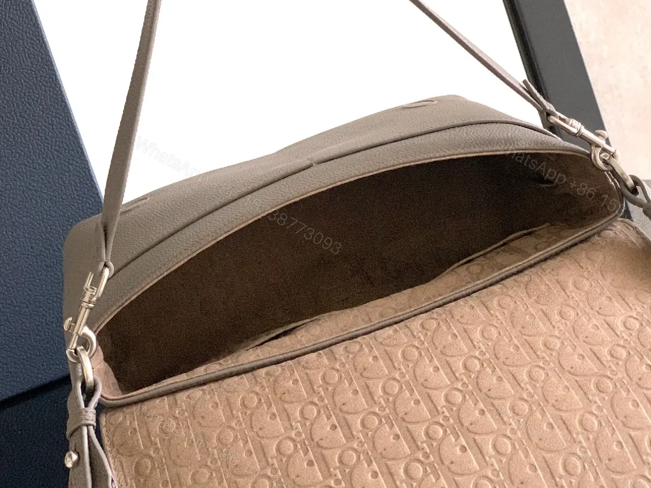 View 2 of Pebble Leather Crossbody: Subtle Branding, Quiet Luxury