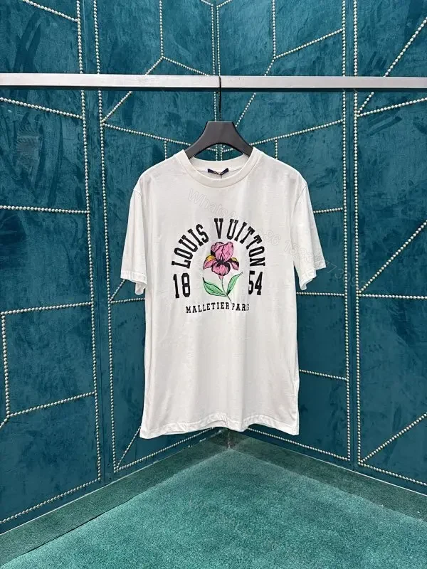 Casual Luxury Graphic Tee: Subtle Floral, Cotton Blend, Relaxed Fit — view 1