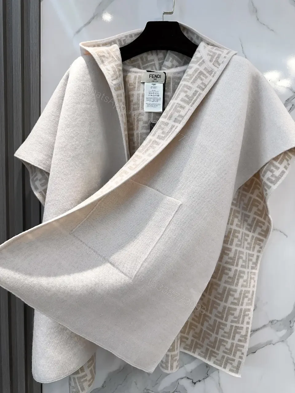 View 5 of Textured Cape Vest with Signature Trim Outerwear