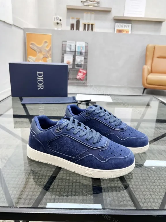 View 8 of Soft-Blend Navy Suede Sneakers with Monogram Detailing, Luxury Style