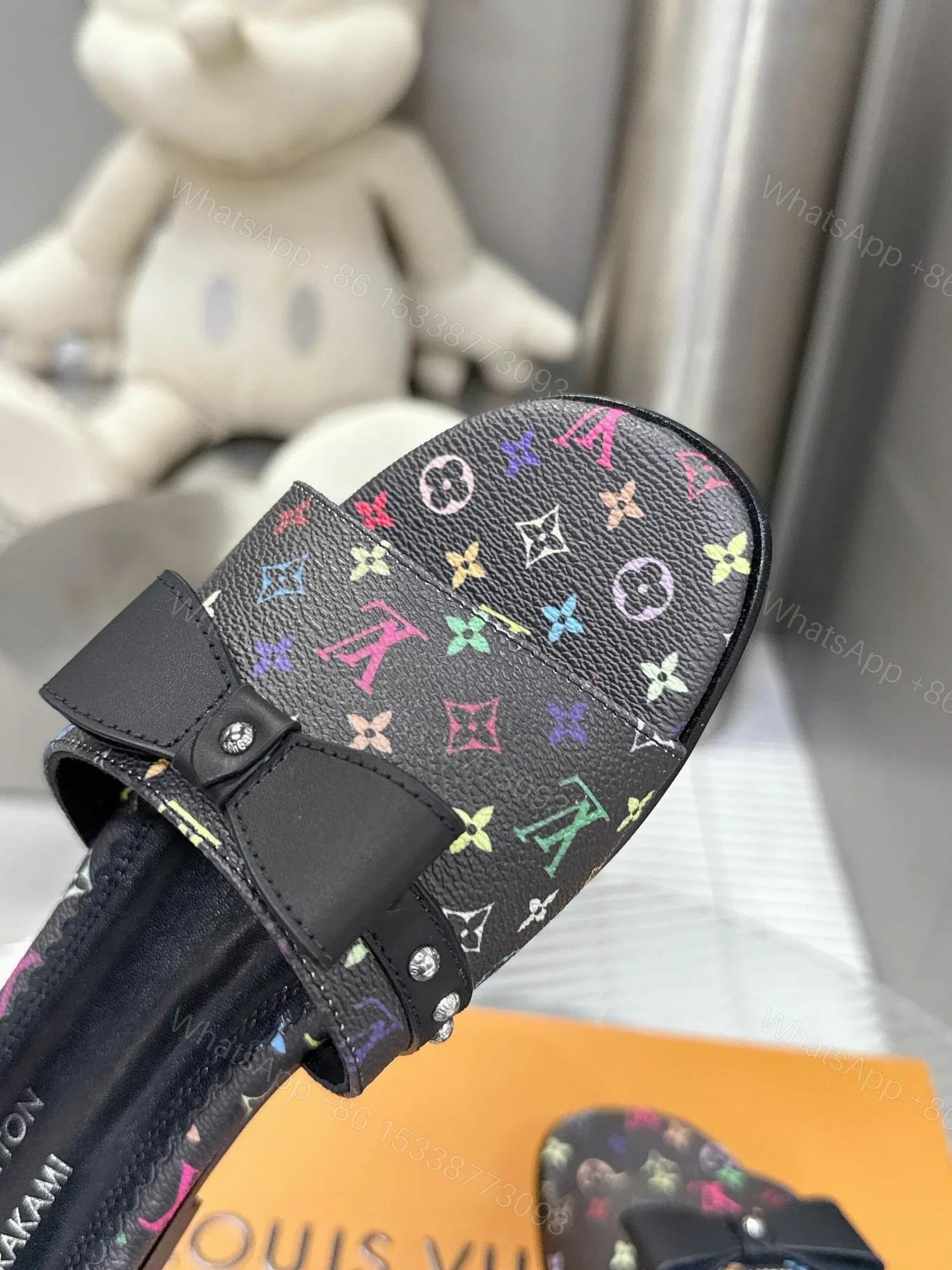 View 2 of LV Women Black Patterned Leather Bow Slide Sandals