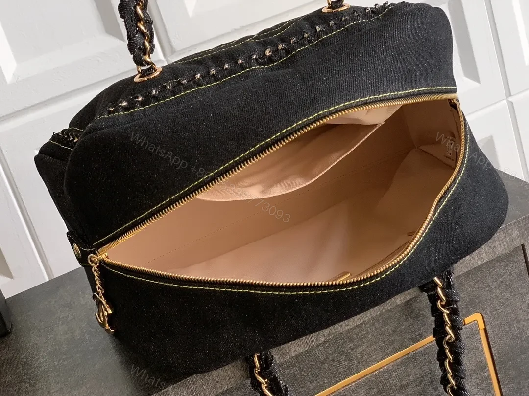 View 2 of Black Velvet Compact Handbag with Gold Stitching