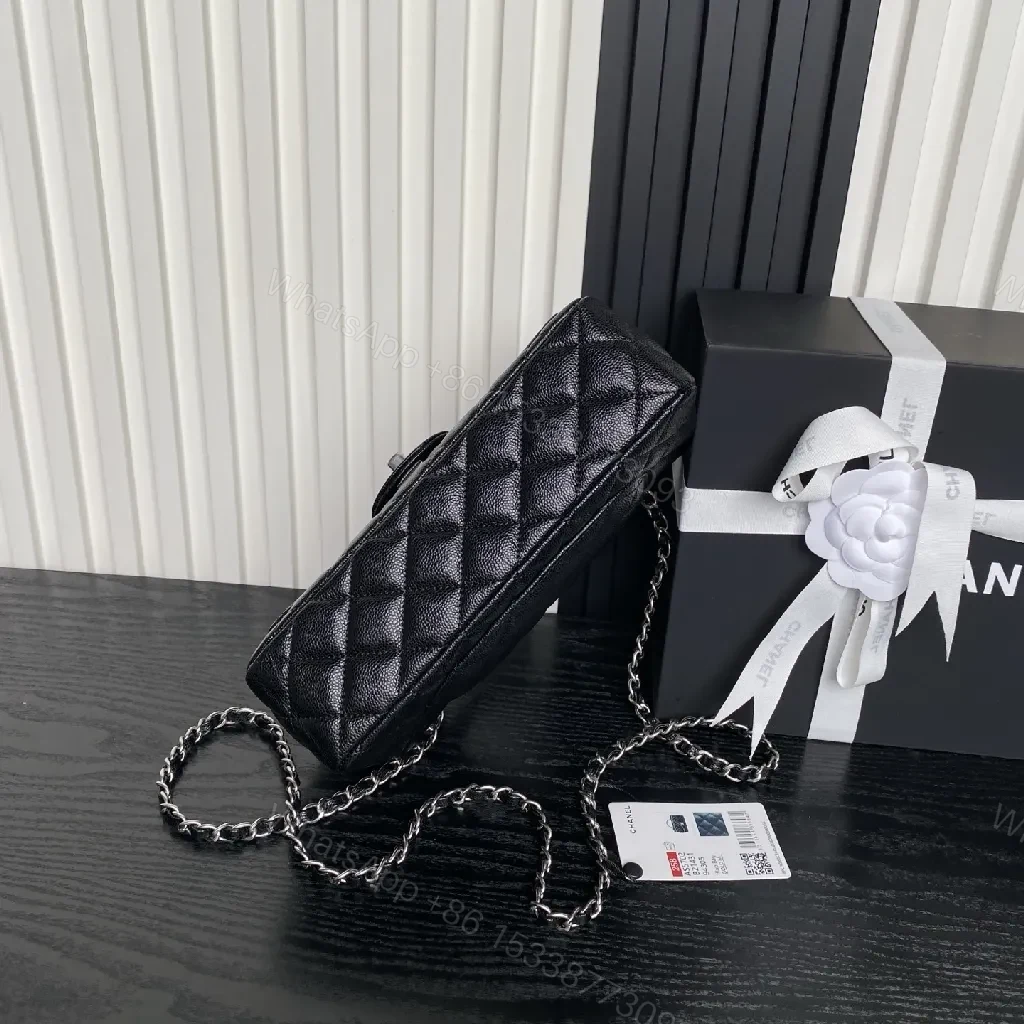 View 7 of Compact Quilted Black Flap Bag with Chain Strap