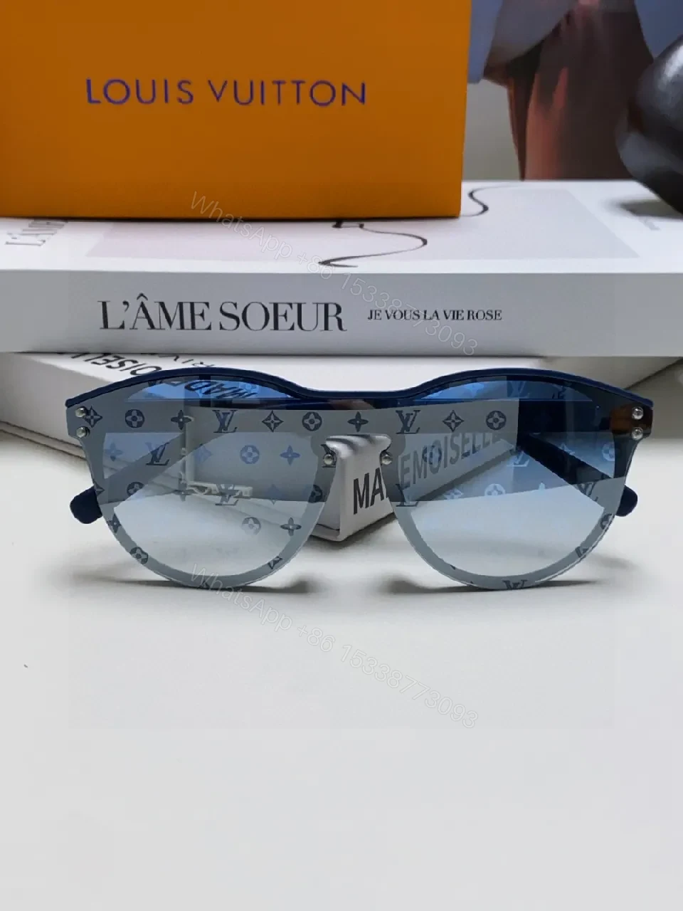 View 6 of Blue Translucent Monogram Shield Sunglasses - Oversized, UV-safe, Light-Weight Acetate