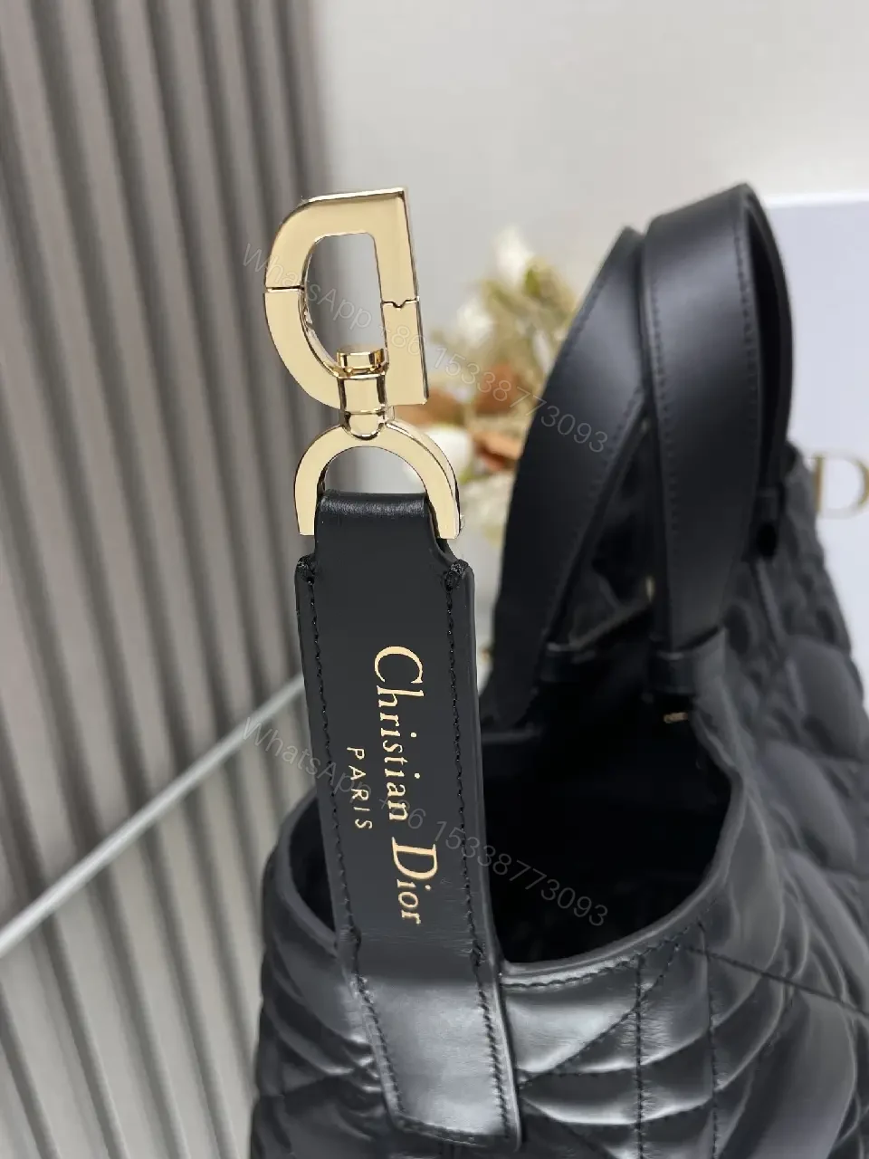 View 4 of Black Quilted Tote with Gold Charm – Luxury Everyday Bag