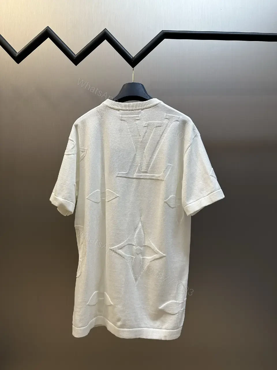 View 5 of Off-White Cream Oversized Tee with Embossed Logo Pattern