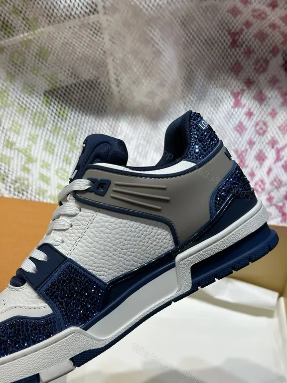 View 8 of White Leather Low-Top Sneakers with Navy LV Accent Brand-Logo