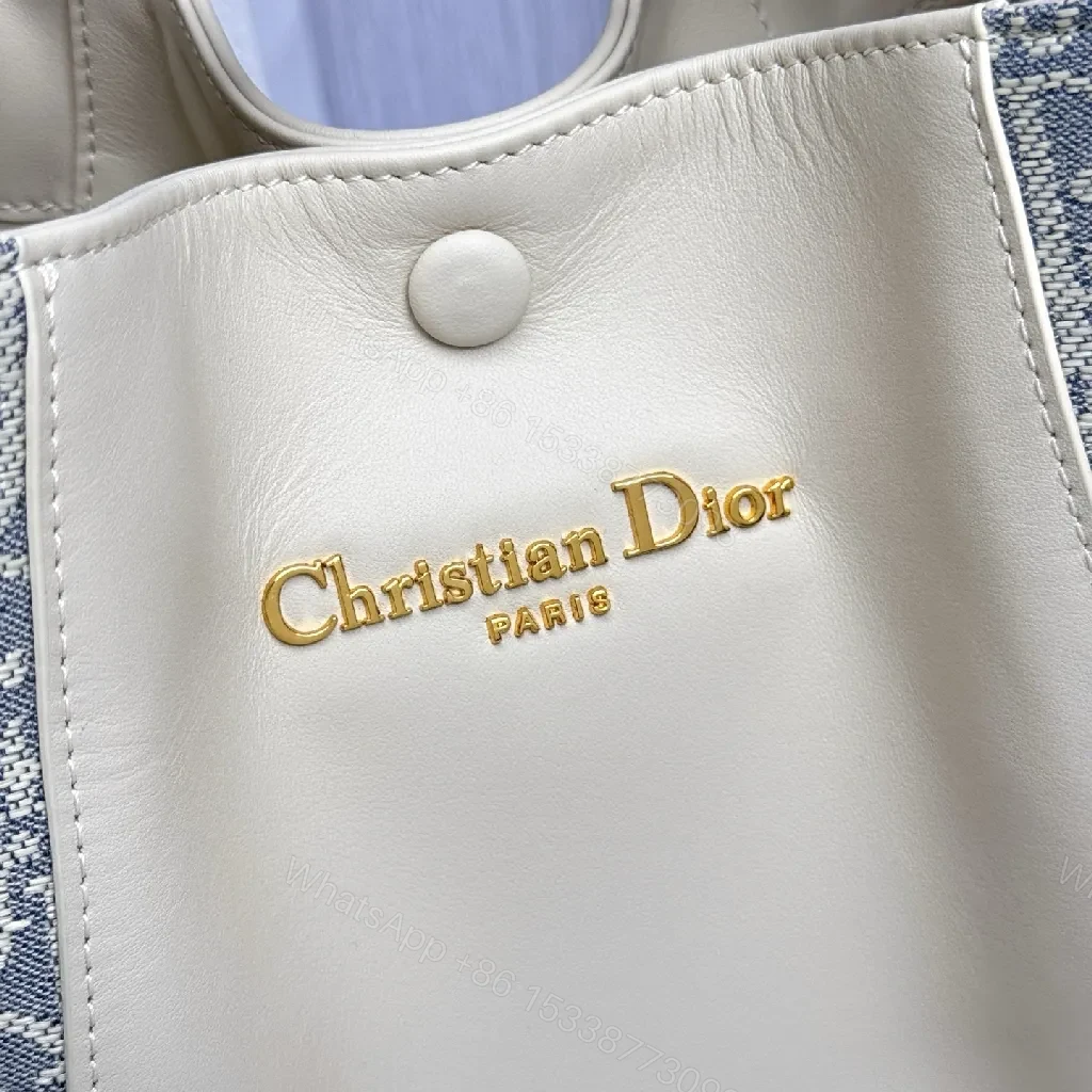View 3 of Cream Leather & Denim-Inspired Bucket Bag, Structured Luxury
