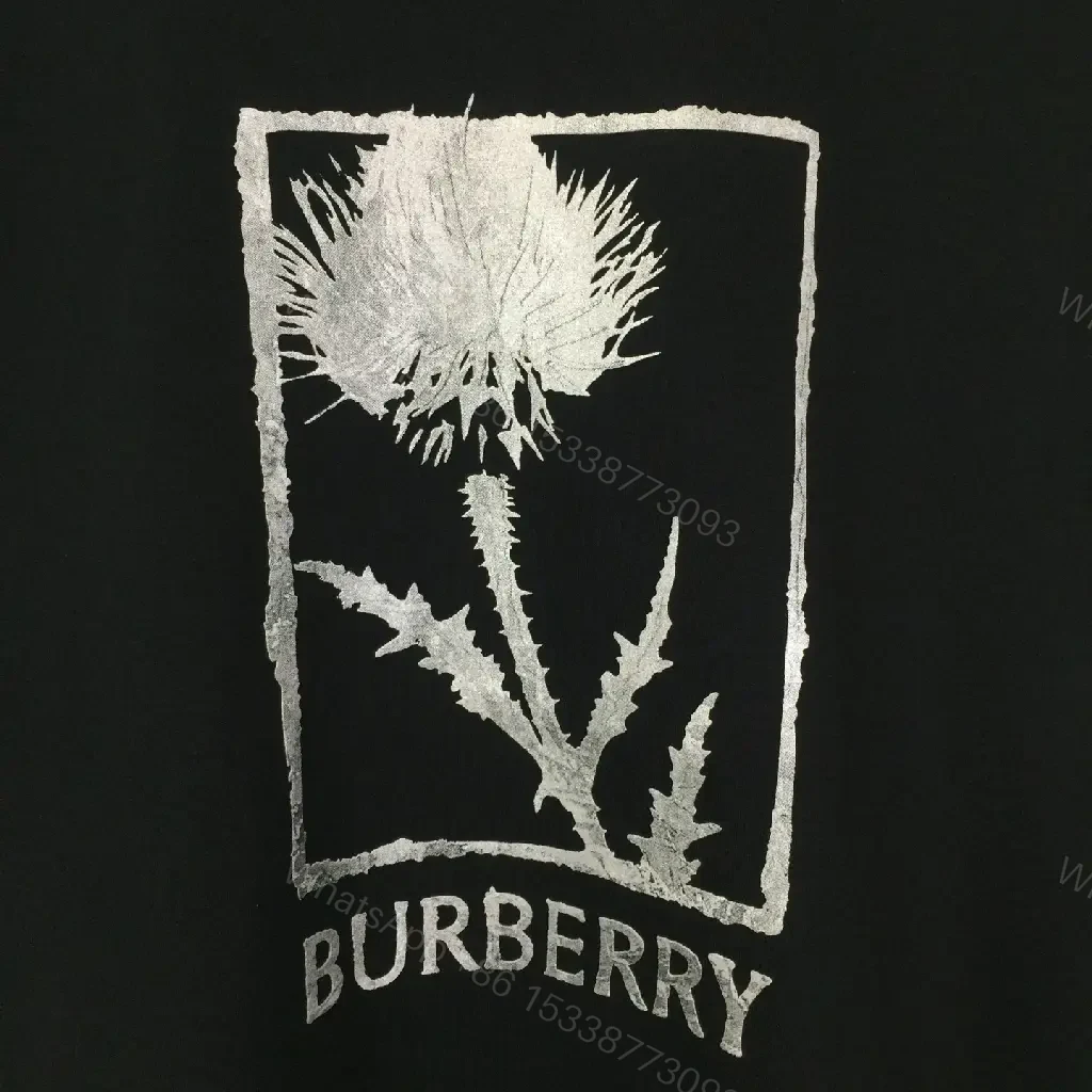 View 3 of Minimalist Black Cotton Tee with Graphic Burberry-Inspired Emblem