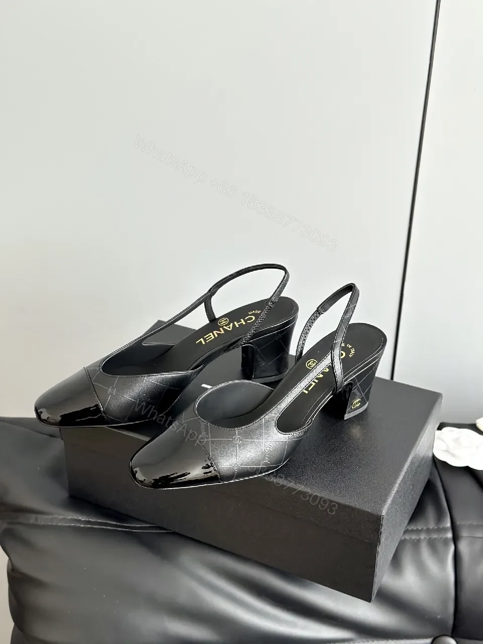 View 9 of Black Leather Slingback Pumps with Quilted Detail