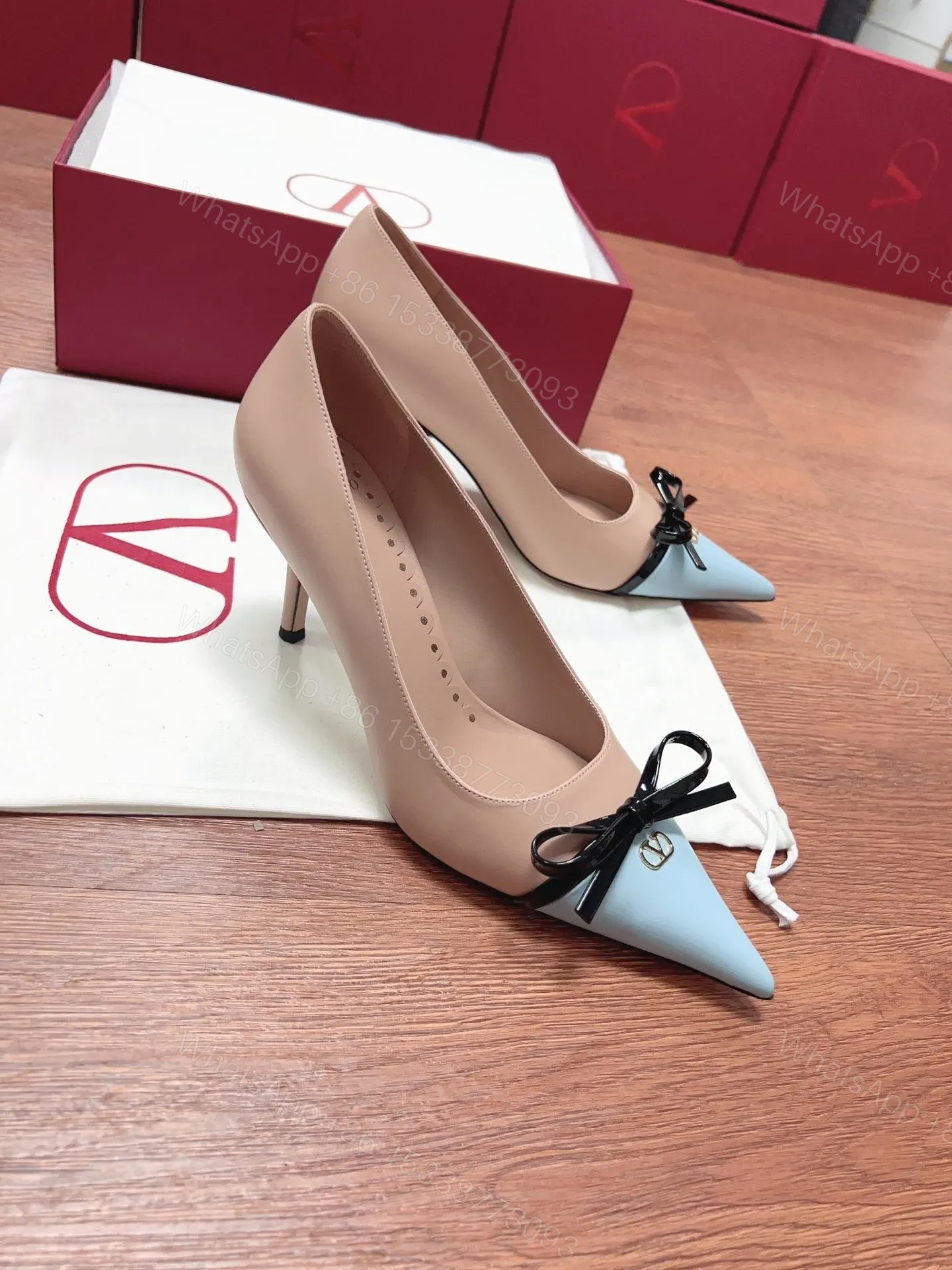 View 3 of Valentino Women Beige Leather Blue Bow Detail Pumps