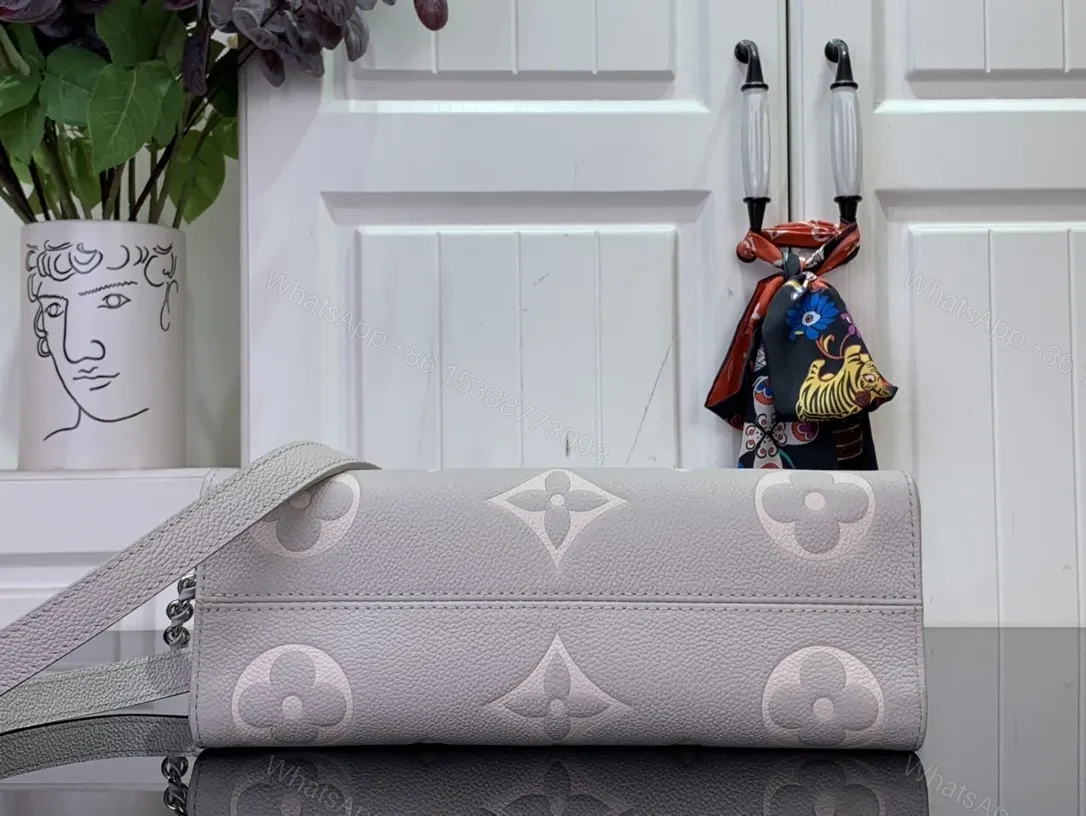 View 5 of Monogram Texture Leather Messenger Bag: Timeless Luxe, All-Day Comfort