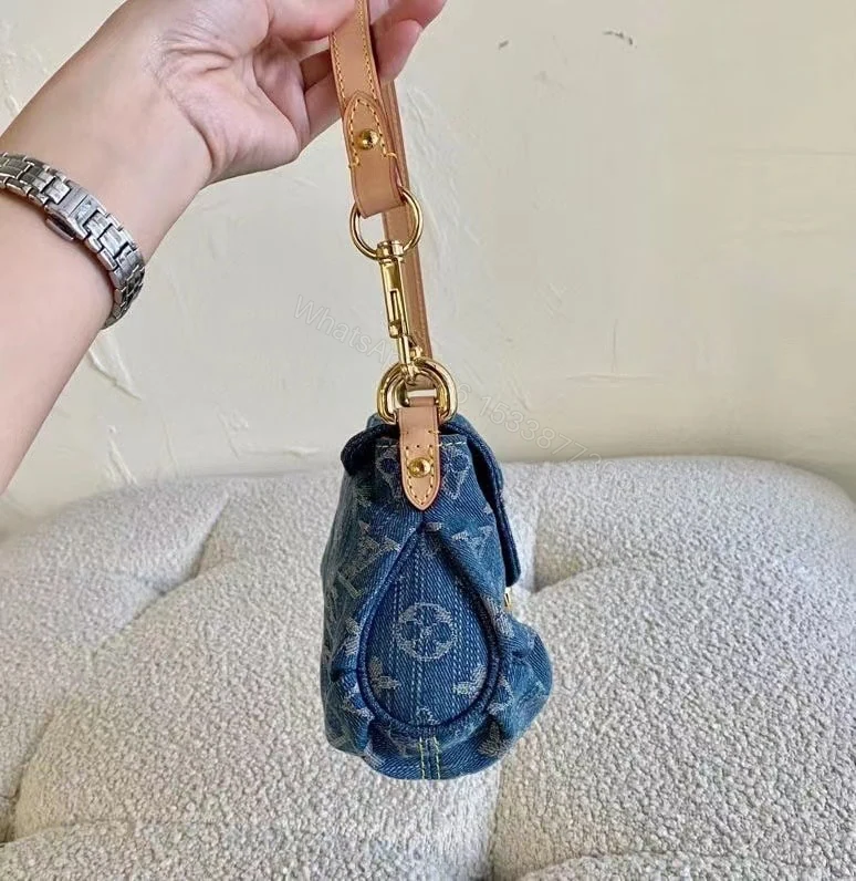 View 6 of Louis Vuitton Pleaty Handbag Monogram Denim Blue 26Cm M95050