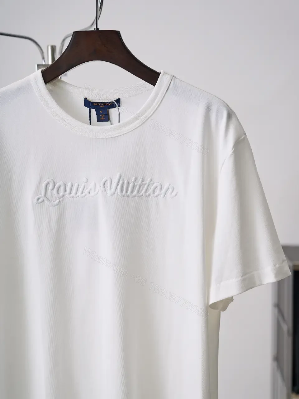 View 7 of White cotton T-shirt with luxury script embroidery for everyday elegance