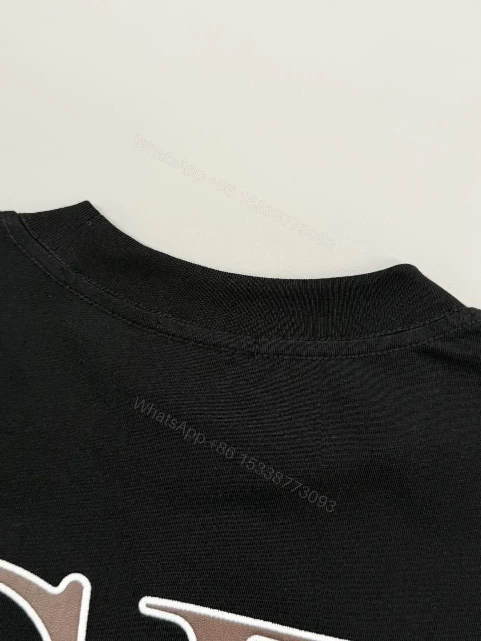 View 7 of Minimalist Black Cotton Tee with Logo Embroidery Luxury Casual Top