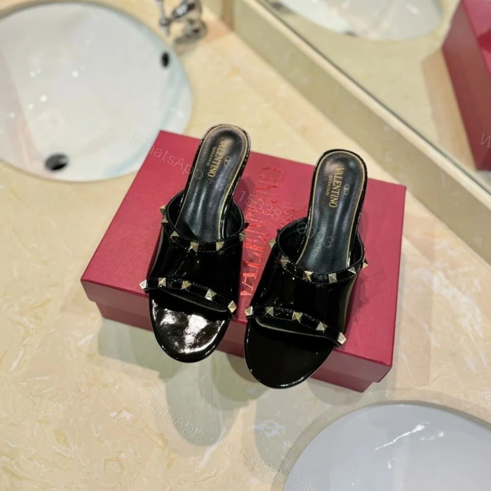View 2 of Valentino Garavani Rockstud Skin Heeled Sandals Black