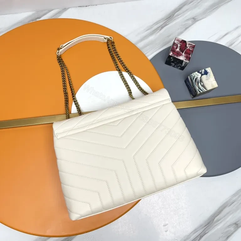 View 9 of Chic Quilted YSL Emblem Crossbody Bag, Ivory, Luxury Style