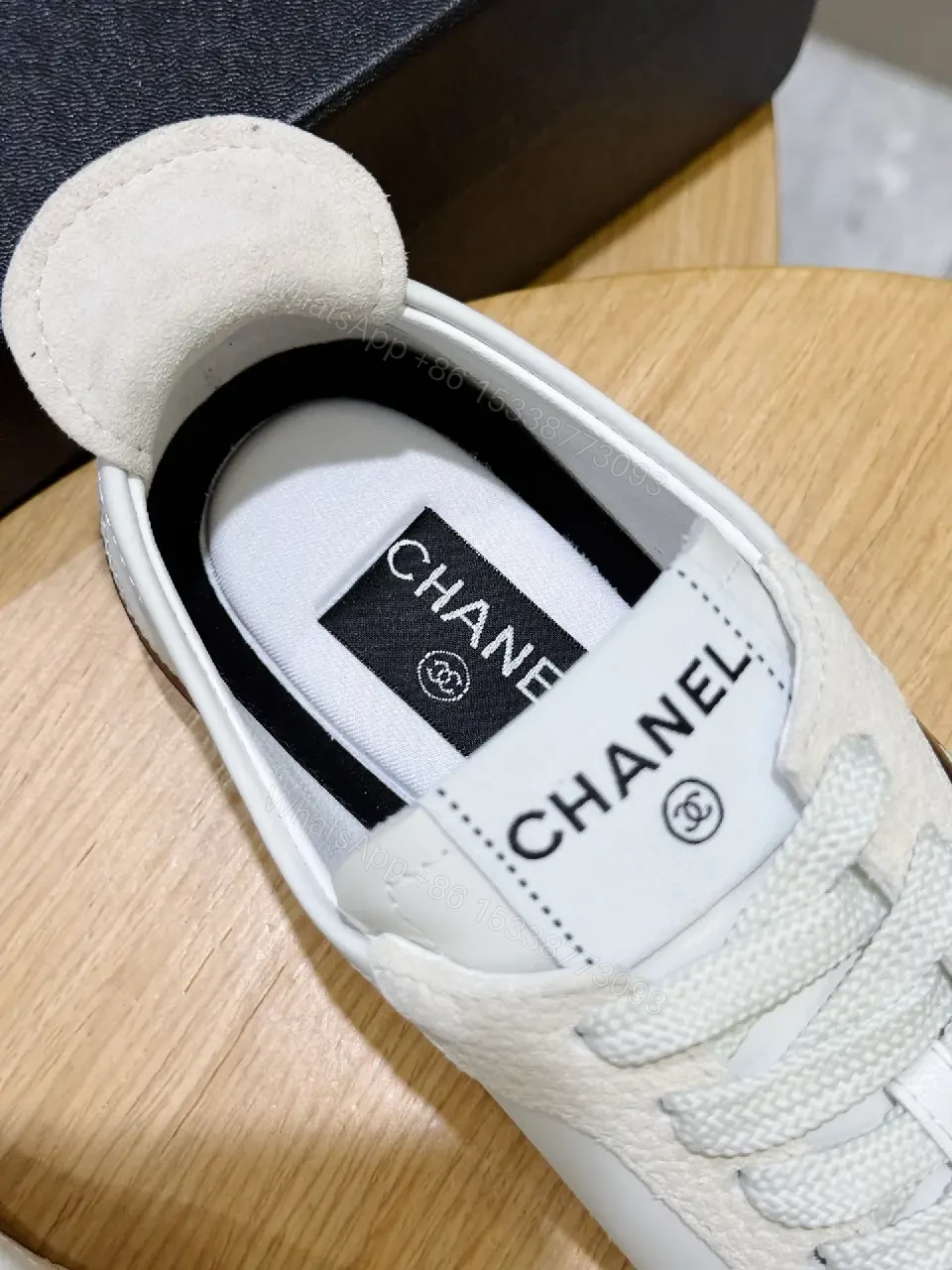 View 10 of White Leather Sneaker Black Toe Classic Chanel Logo Shoes
