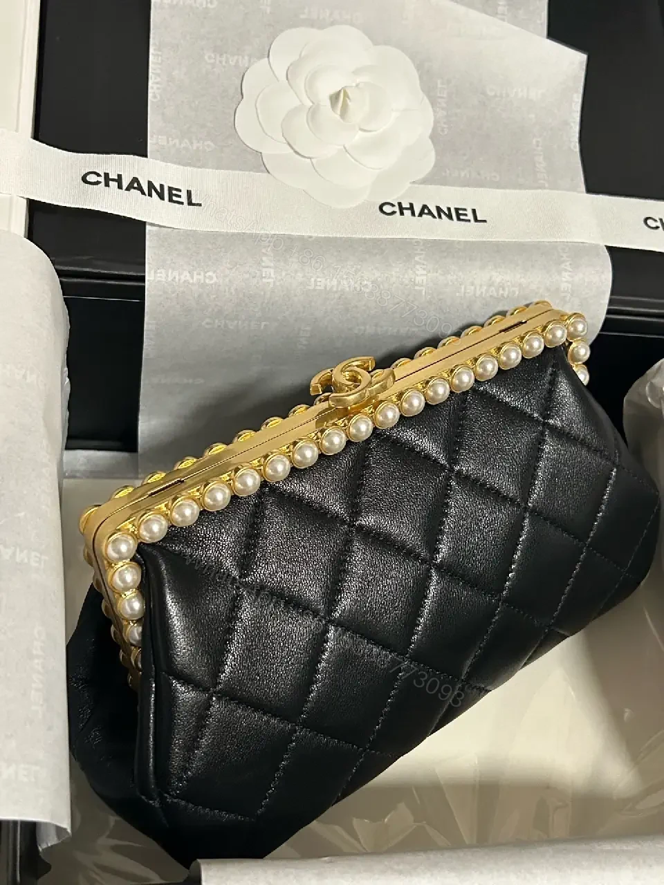View 9 of Black Quilted Leather Clutch with Pearl Trim, Gold Frame, Elegant