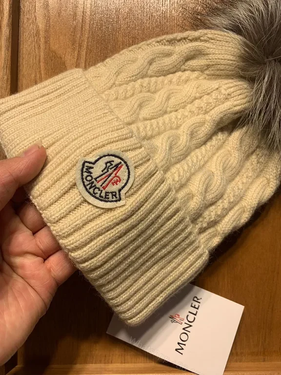 View 7 of Cream Cable-Knit Beanie with Faux-Fur Pom-Pom: Moncler Warmth
