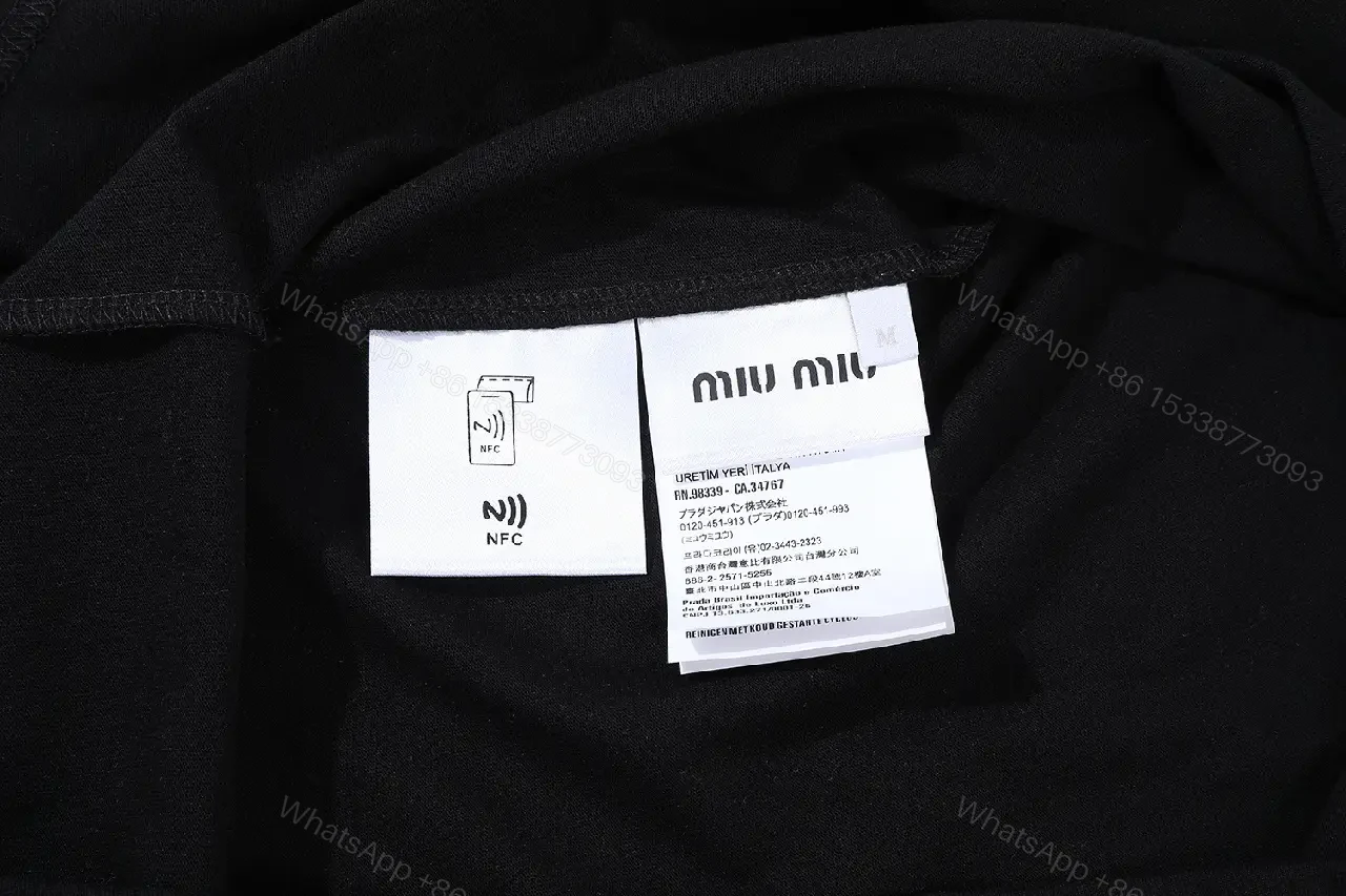 View 2 of Black Cotton Minimalist Tee – Subtle Chest Logo, Premium Essential