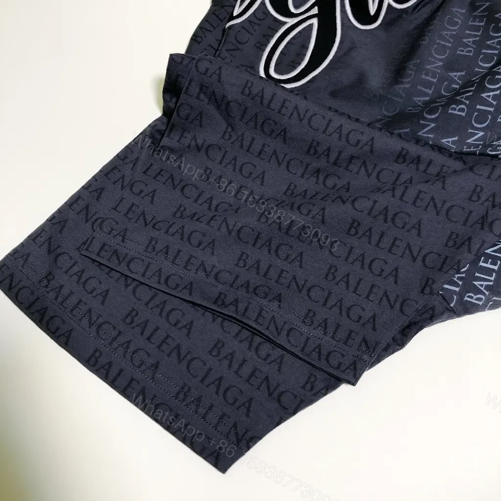 View 2 of Navy Balenciaga Script Graphic T-Shirt shirt