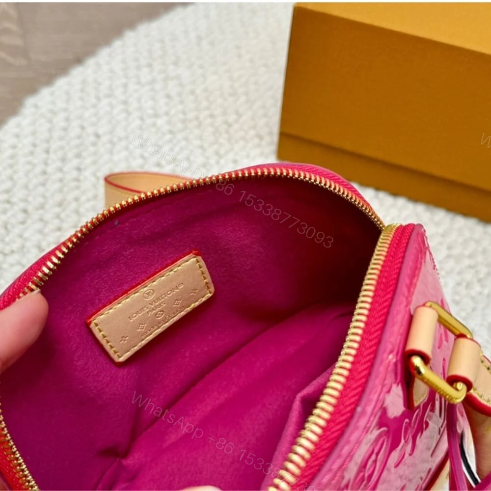 View 8 of Louis Vuitton Alma Nano Monogram Vernis Embossed Neon Pink 18Cm M90611