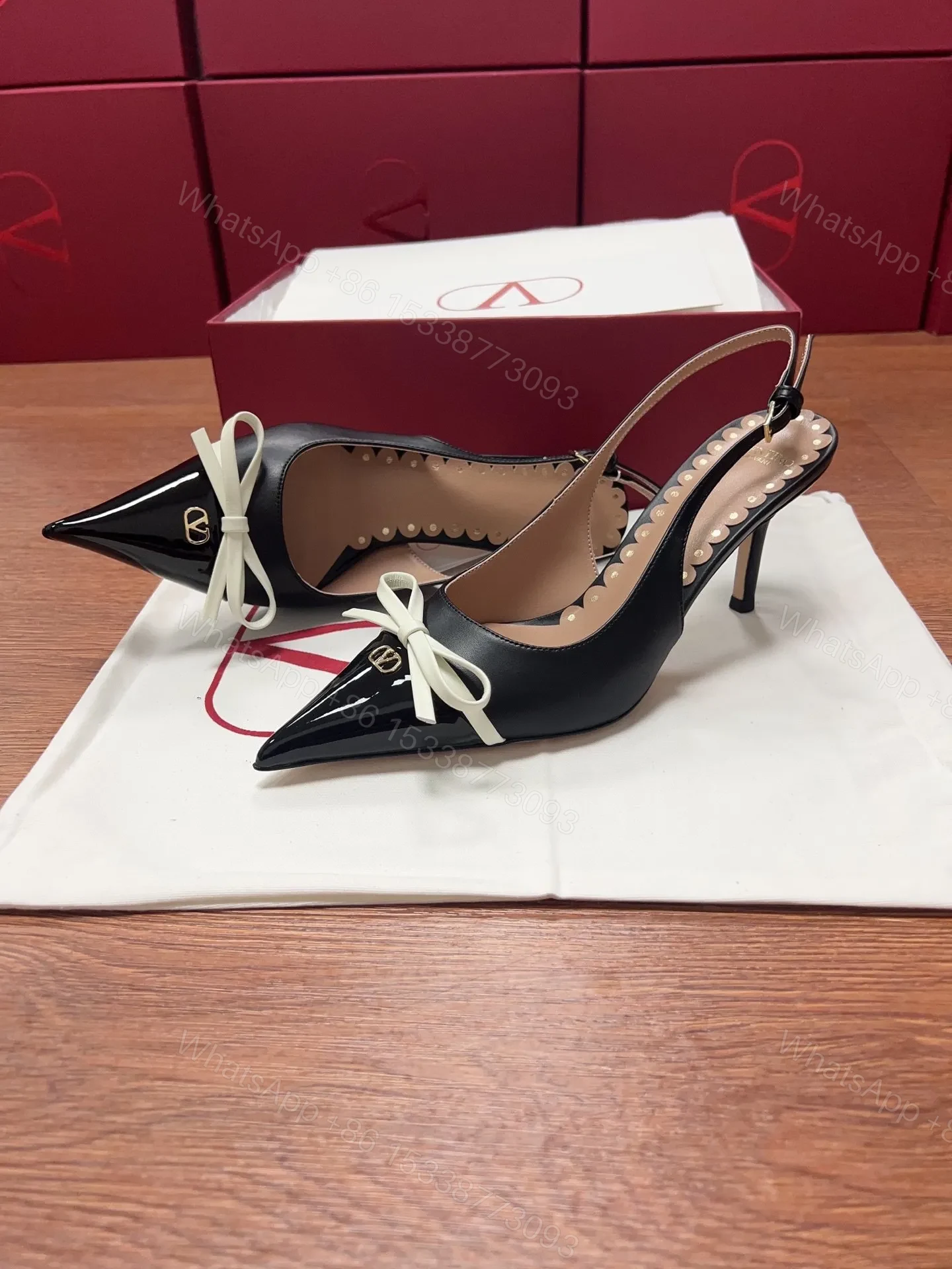View 4 of Valentino Women Black Patent Leather Bow Slingback Pumps