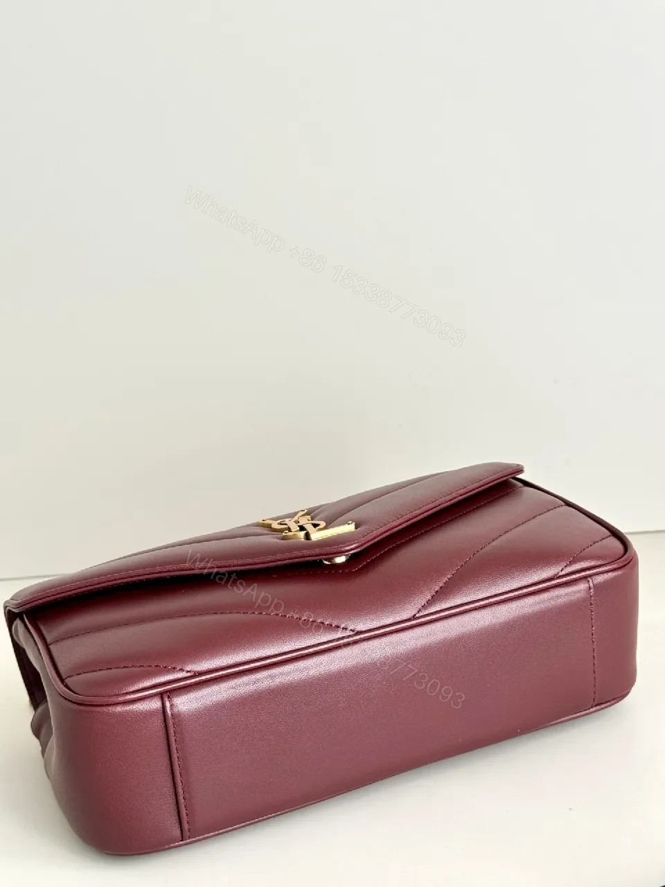 View 7 of Burgundy Quilted Satchel with Gold Chain Detail