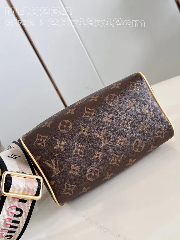 View 9 of Structured Monogram Mini Tote: Compact, All-Season Luxury