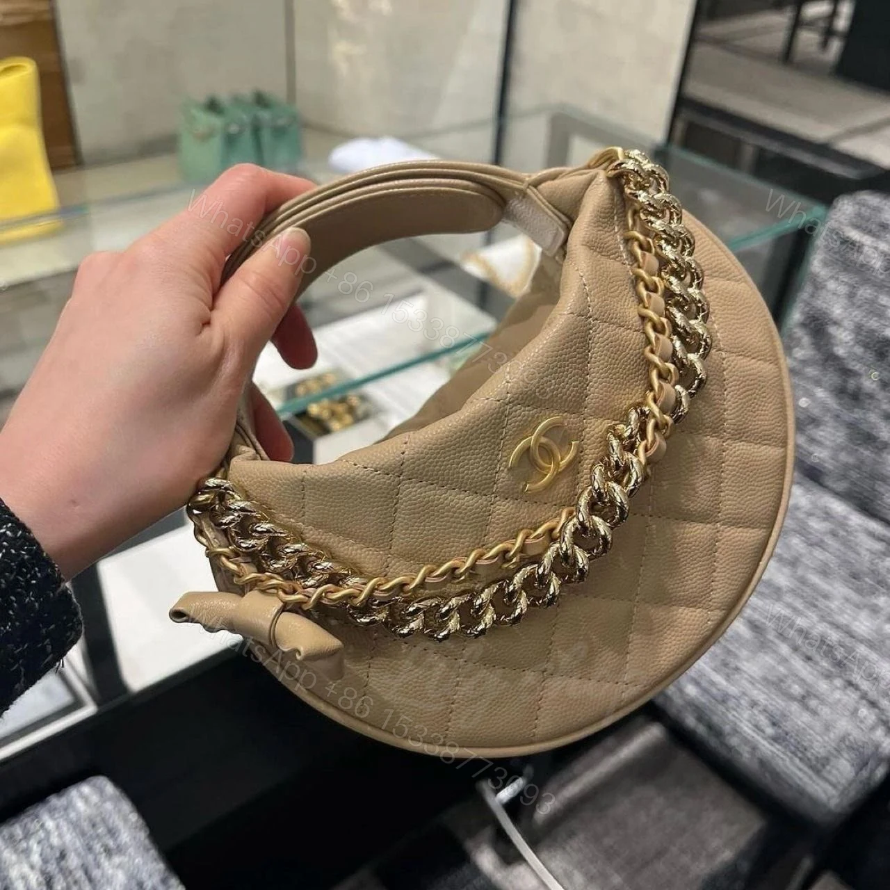View 2 of Chanel Shiny Caviar Quilted Bow Pouch Hobo