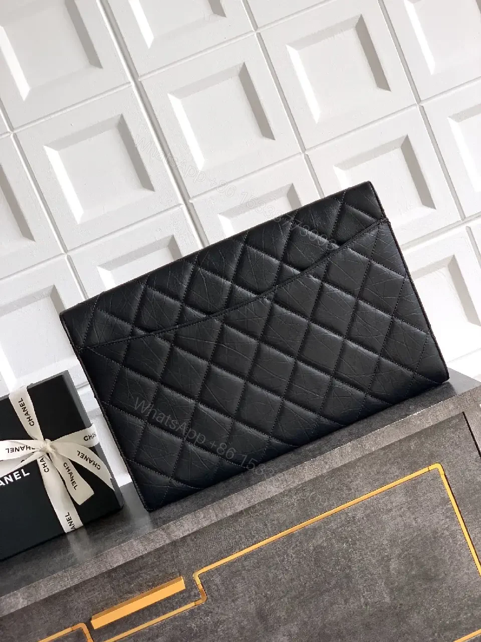 View 9 of Compact Quilted Leather Wallet with Gold Logo