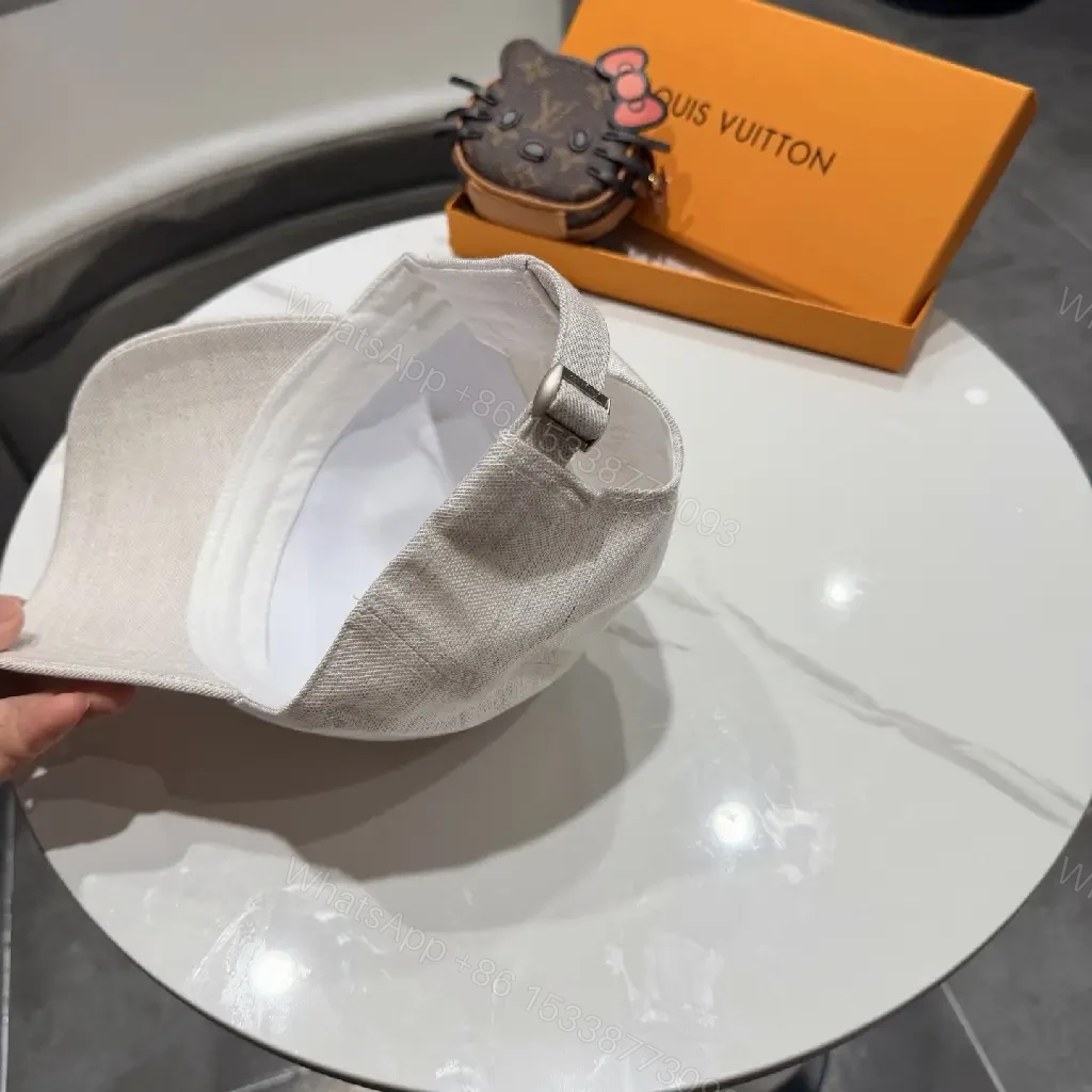 View 10 of Cozy Chic Cap: Subtle LV Logo, All-Season Cotton blend Cap