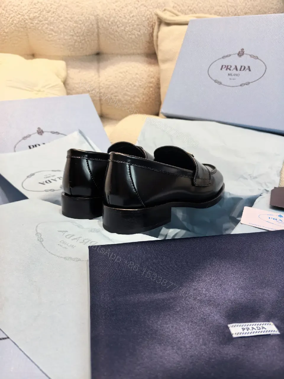 View 5 of Black Leather Prada Slippers with Logo Trim