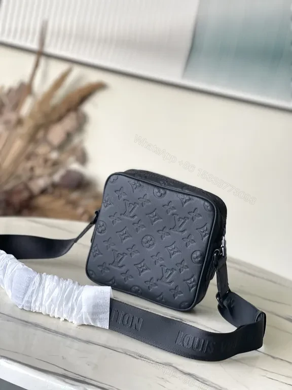 View 3 of Black Monogram Leather Messenger: Compact, Weather-Ready Luxury