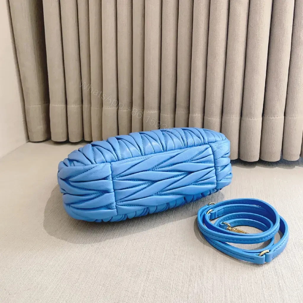 View 4 of Bright Royal Blue Quilted Crescent Handbag with Gold Miu Miu Logo