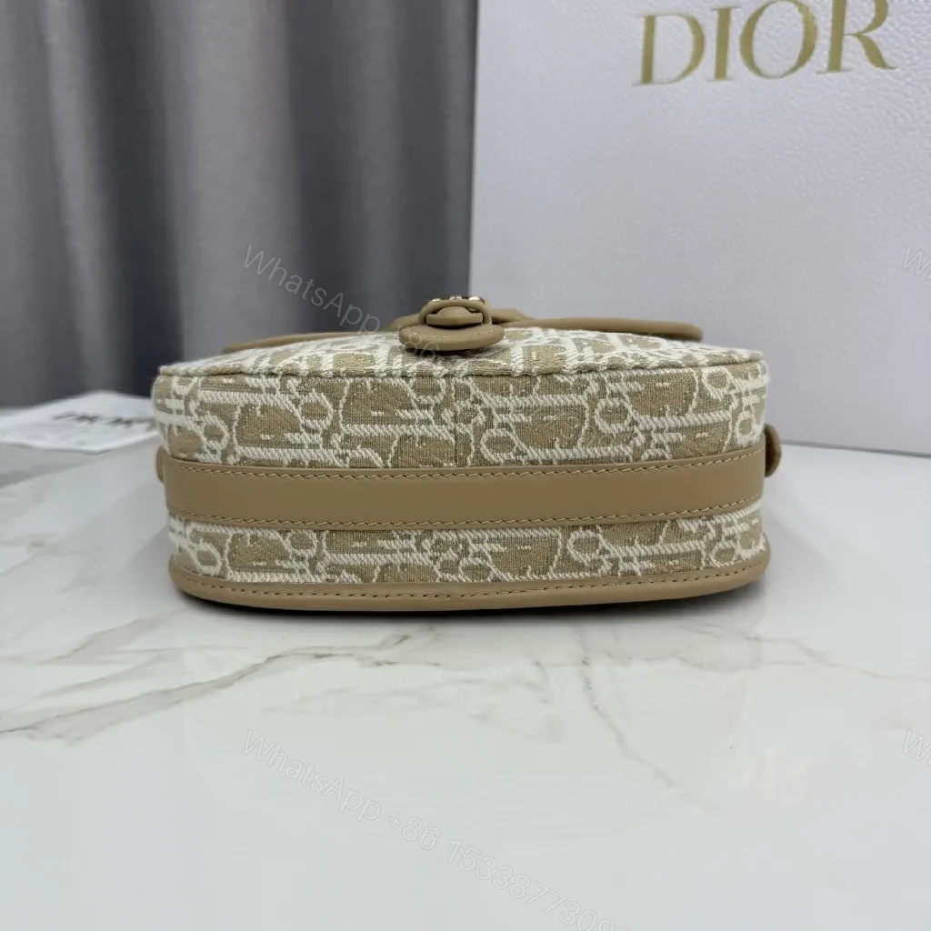 View 3 of Beige Monogram-Textured Leather Mini Shoulder Bag