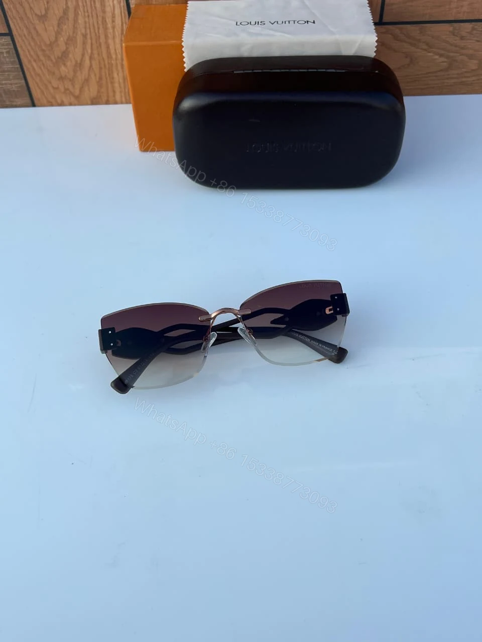 View 2 of Louis Vuitton Rimless Aviator Sunglasses Brown Gradient