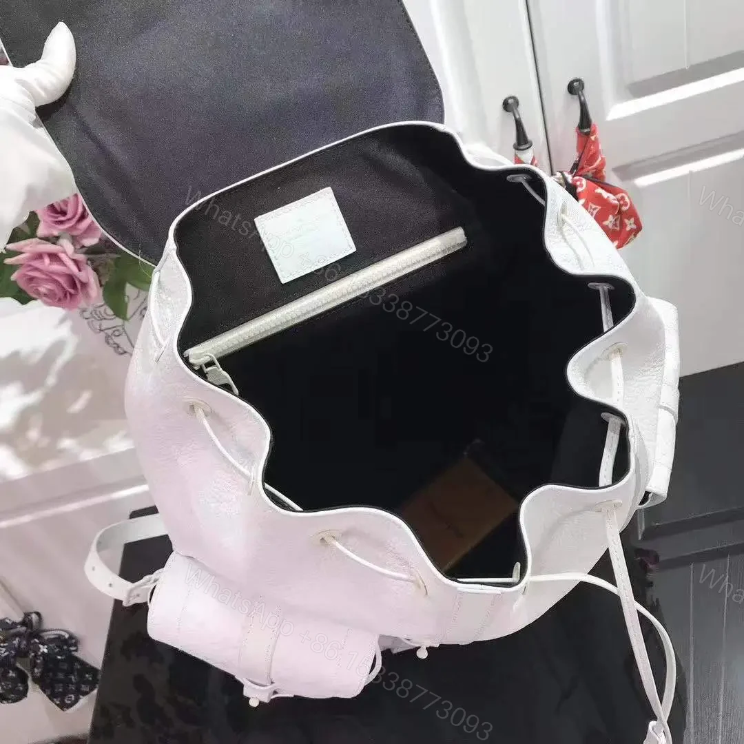 View 4 of Louis Vuitton Christopher Monogram Empreinte White